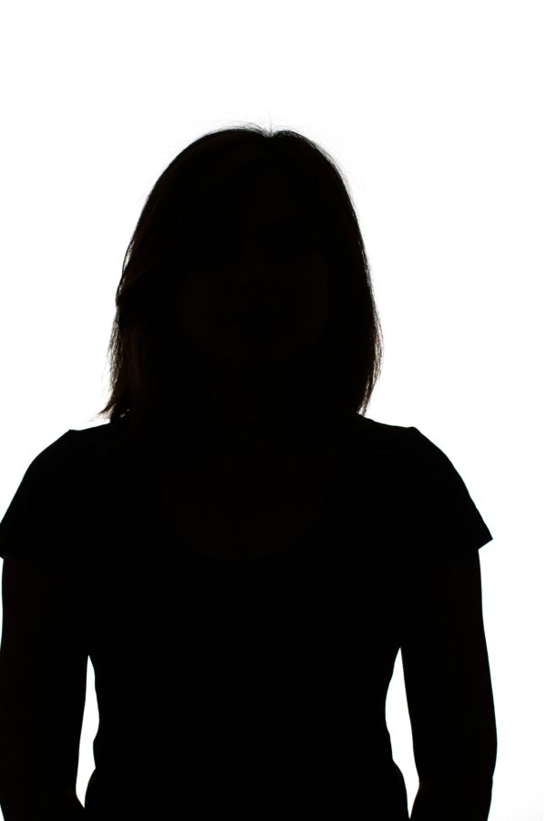 silhouette of a young woman on white background